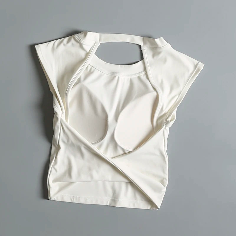 Camiseta deportiva corta sin espalda con almohadillas fijas en el pecho para mujer