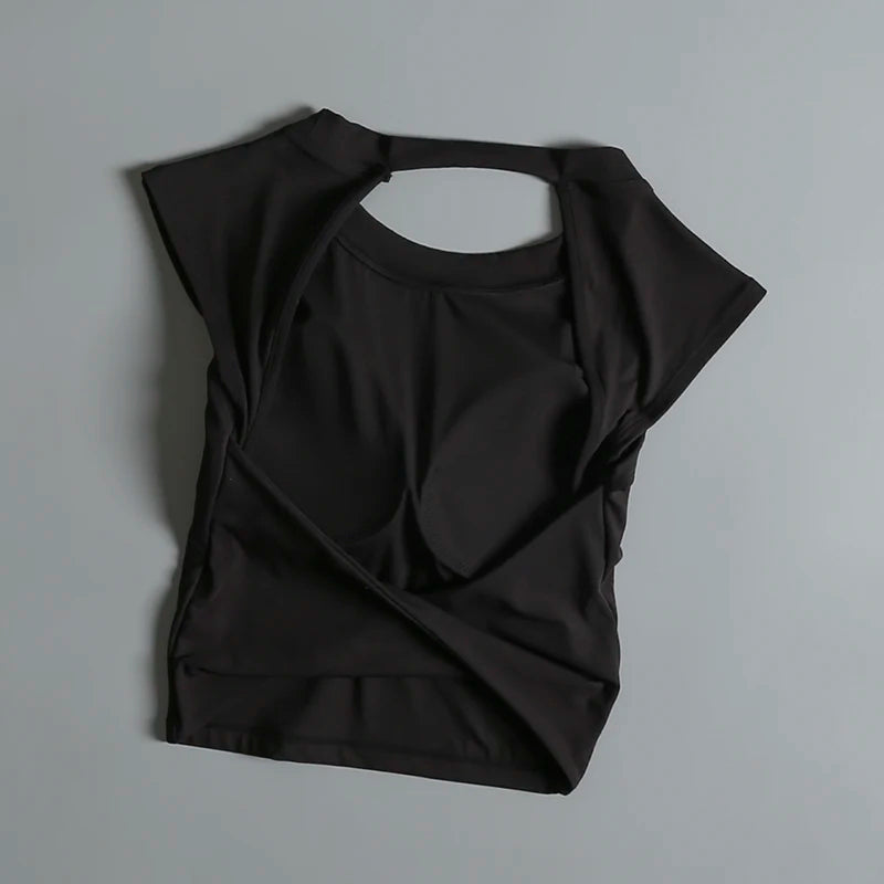 Camiseta deportiva corta sin espalda con almohadillas fijas en el pecho para mujer