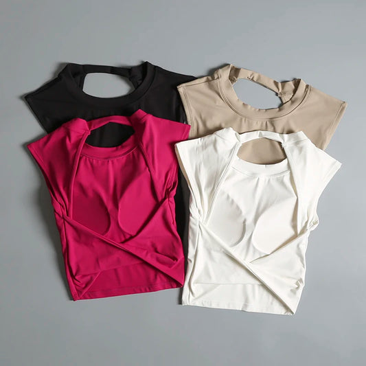 Camiseta deportiva corta sin espalda con almohadillas fijas en el pecho para mujer