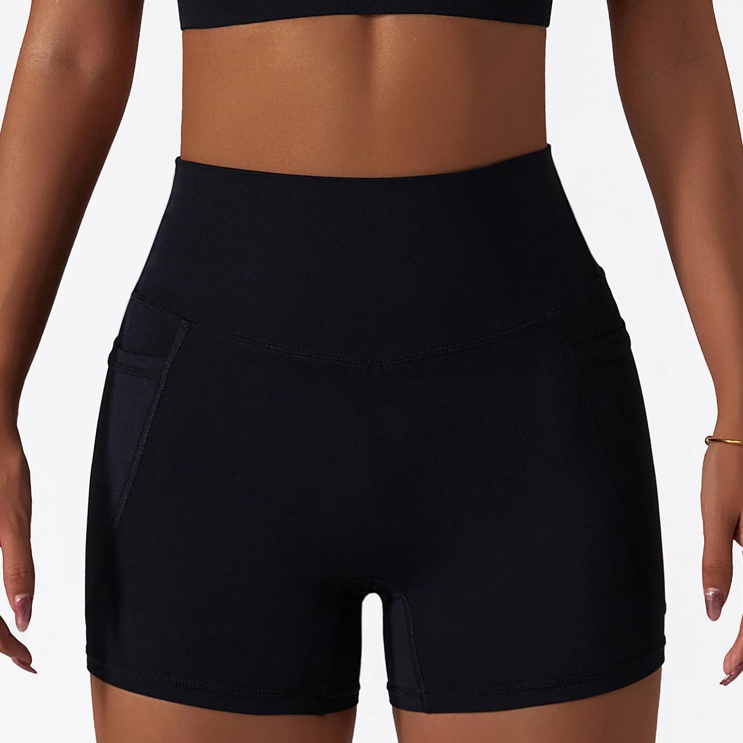 Pantalon corto de cintura alta con efecto push up y realce de cadera con bolsillo para deporte.