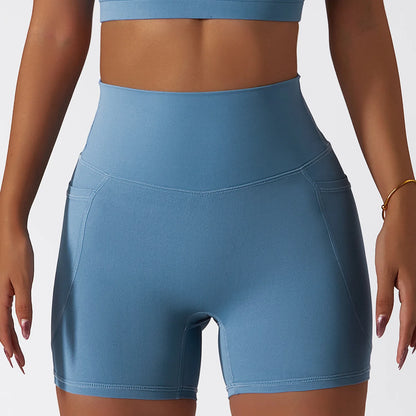 Pantalon corto de cintura alta  con efecto push up y realce de cadera con bolsillo para deporte.